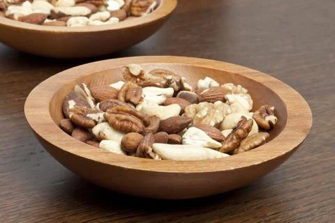 Bowl of assorted fresh nuts Stock Photos