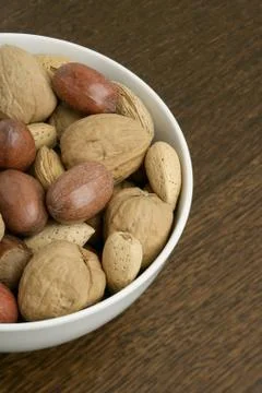 Bowl with assorted nuts Stock Photos