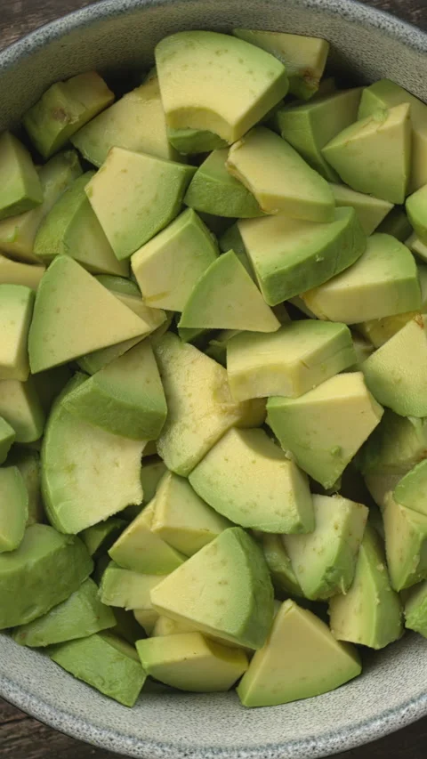 A bowl of avocado chunks. Video stock 331280271