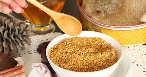 Bowl of bee pollen with honey com 12 Stock Footage 99213617