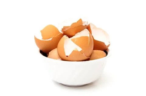 Bowl with broken egg Stock Photos