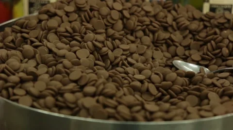 Bowl of brown milk chocolate chips Stock Footage 59771217
