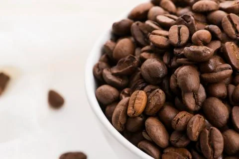Bowl of caffee beans on a white background Stock Photos