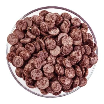 Bowl of circular chocolates Fotos de archivo