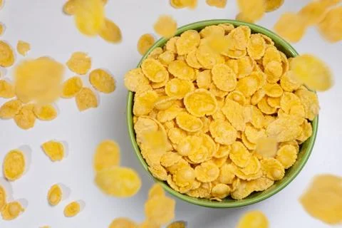 Bowl of corn flakes isolated on white background Stock Photos