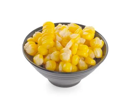 Bowl with corn kernels on white background Stock Photos