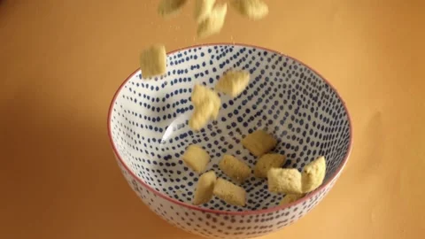Bowl with corn pads. Slow motion Stock Footage 148500121