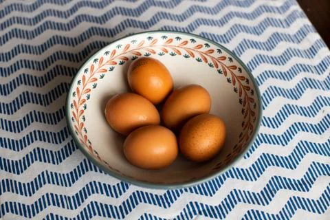 Bowl of eggs, five brown eggs in a bowl Stock Photos