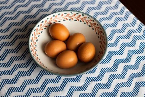 Bowl of eggs, five brown eggs in a bowl Stock Photos