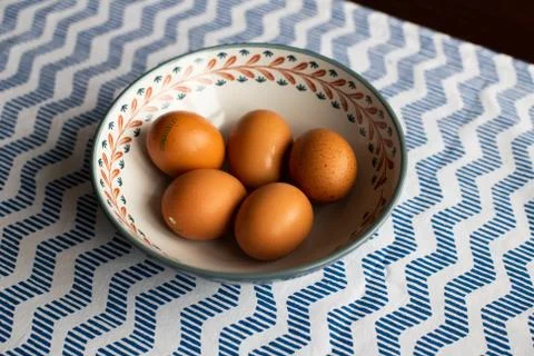 Bowl of eggs, five brown eggs in a bowl Stock Photos