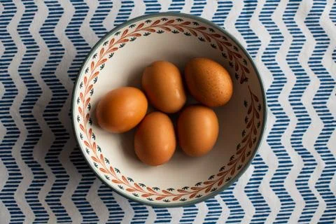 Bowl of eggs, five brown eggs in a bowl Stock Photos
