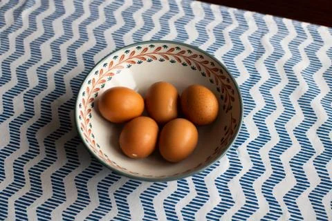 Bowl of eggs, five brown eggs in a bowl Stock Photos