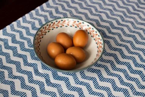 Bowl of eggs, five brown eggs in a bowl Stock Photos
