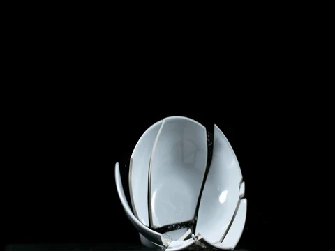Bowl falling and exploding on Black Background, Slow Motion 4K Video stock 75980764