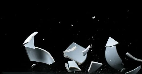 Bowl falling and exploding on Black Background 스톡 사진