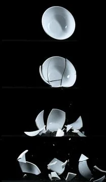 Bowl falling and exploding on Black Background Foto stock