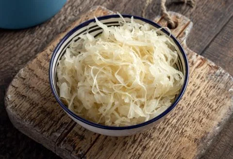 A bowl of fermented cabbage Stock Photos