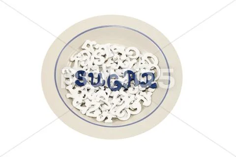 Bowl filled with white letters with blue letters spelling SUGAR Stock Photos