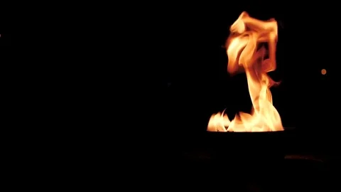Bowl of fire in the street at night. Fire show Stock Footage