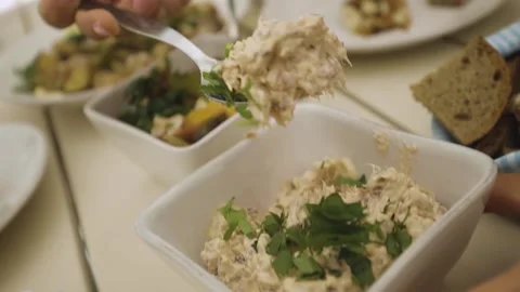 A bowl of food on a table Stock Footage 155452944