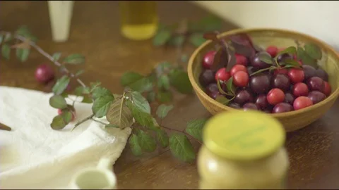 Bowl of fresh plums kept in kitchen Stock Footage 76139501