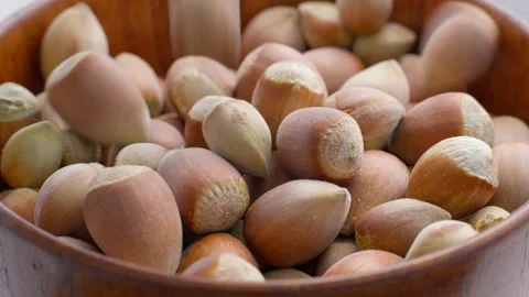 Bowl full of hazelnuts close-up Stock Footage 315119542