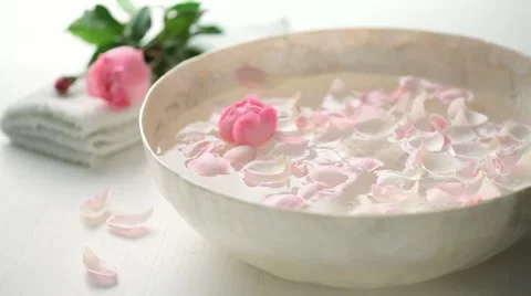 Bowl full of rose petals Stock Footage