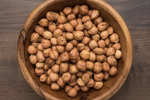 Bowl of hazelnuts Stock Photos