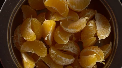 A bowl of mandarins on a table. Stock Footage 69937204