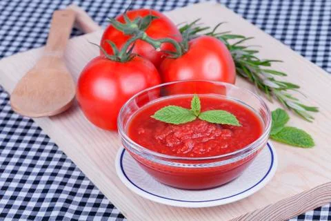 A bowl of mashed tomato with tomatoes Stock Photos