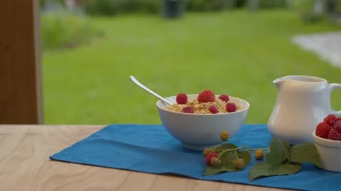 Bowl of muesli with raspberry Stock Footage 137626683