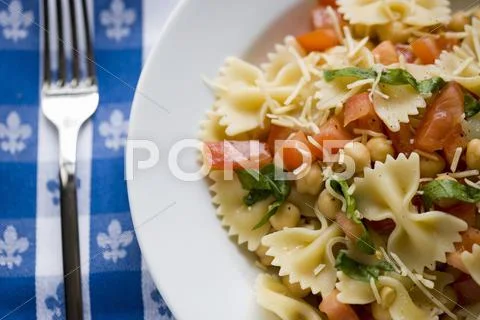 Bowl of Pasta Salad with Chickpeas, Tomatoes and Fresh Herbs Stock Photos