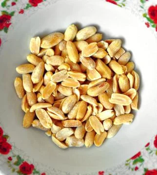 Bowl of peanuts Stock Photos