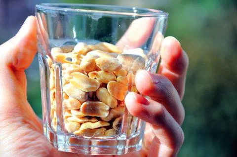 Bowl of peanuts Stock Photos