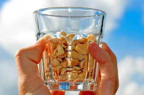 Bowl of peanuts Stock Photos