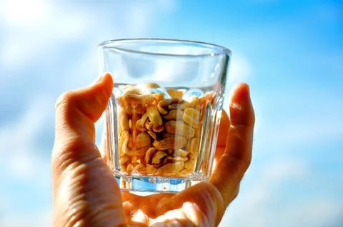 Bowl of peanuts Stock Photos