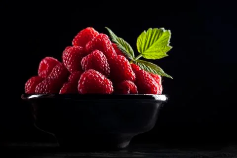 Bowl of raspberry Stock Photos