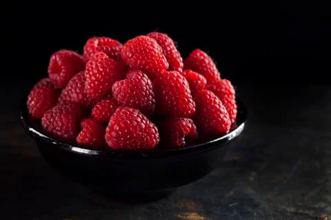 Bowl of raspberry Stock Photos