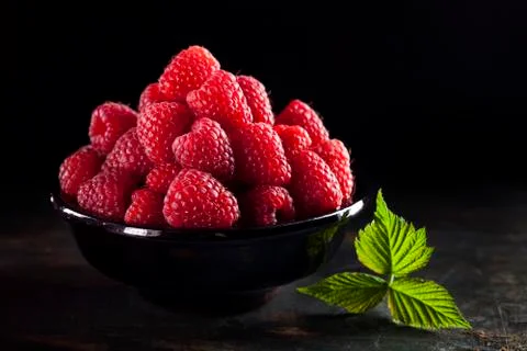 Bowl of raspberry Stock Photos