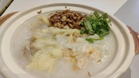 A bowl of seafood congee Stock Footage 262625832