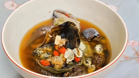 A bowl of seafood Stock Footage 306565794