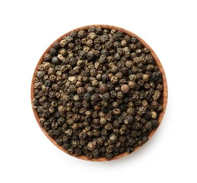 Bowl of spicy black pepper grains isolated on white, top view Stock Photos