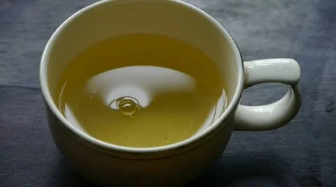 A bowl of steaming tea.china,water. Stock Footage