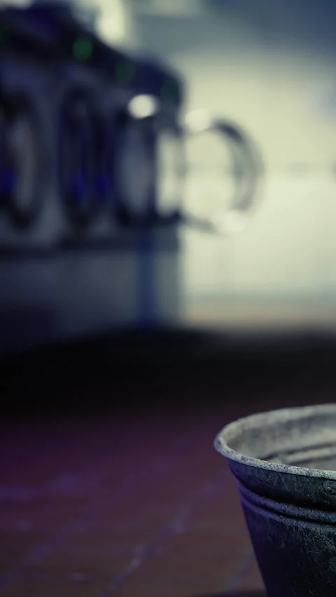 Bowl on a table near an empty cafe kitchen during quiet evening hours Stock Footage 331646237
