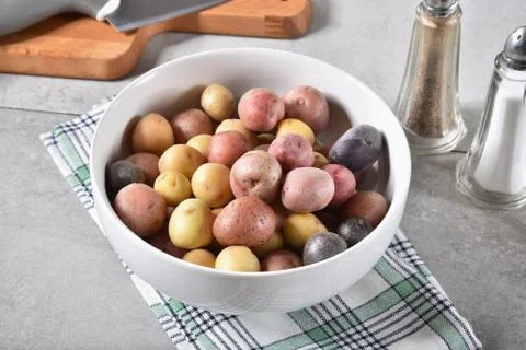 Bowl of tiny potatoes Stock Photos