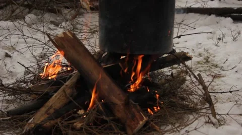 Bowler on the Bonfire on the snow Stock Footage 40433701
