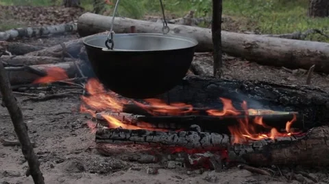 Bowler over a campfire Stock Footage 45410874