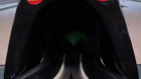 The bowling ball goes from approach to return post in the bowling alley Stockbeeldmateriaal 276646226