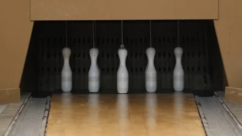 Bowling ball going into the pins. Nine Pin Bowling Stock Footage 73420135