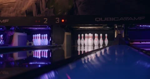 Bowling Ball Hitting Pins Stock Footage 141203492